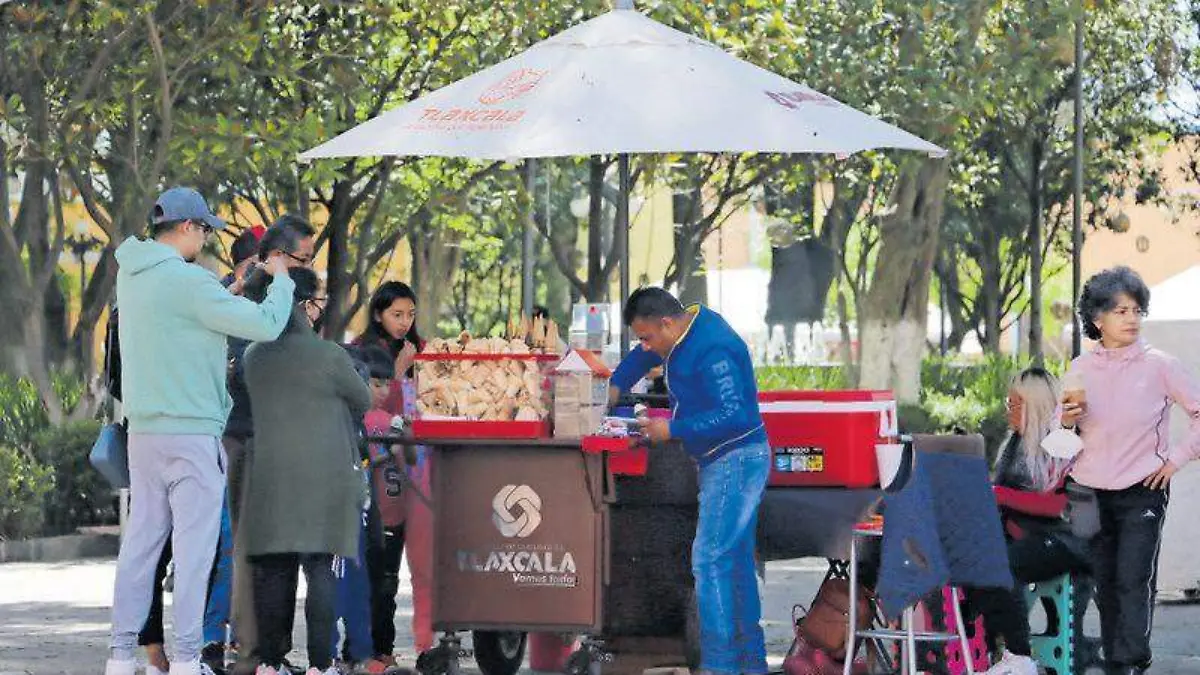 Comerciantes, trabajadores, parque, economía